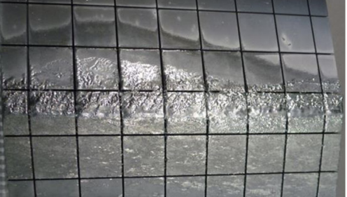Damaged beryllium wall panel on JET tokamak after a vertical displacement event